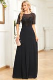 Vestido formal negro brillante con mangas cortas