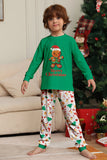 Verde conjunto de pijama familiar a juego navideño con estampado de Papá Noel.