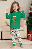 Verde conjunto de pijama familiar a juego navideño con estampado de Papá Noel.