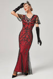 Vestido largo flapper de lentejuelas rojas de la década de 1920