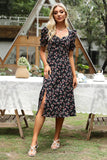 Vestido midi de verano negro con estampado floral