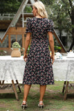 Vestido midi de verano negro con estampado floral