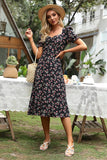 Vestido midi de verano negro con estampado floral