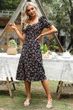 Vestido midi de verano negro con estampado floral