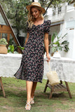 Vestido midi de verano negro con estampado floral