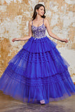 Precioso vestido de fiesta largo azul real con tirantes de espagueti de una línea con apliques de volantes